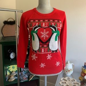 LOL vintage brand Christmas sweater with penguins.
No flaws